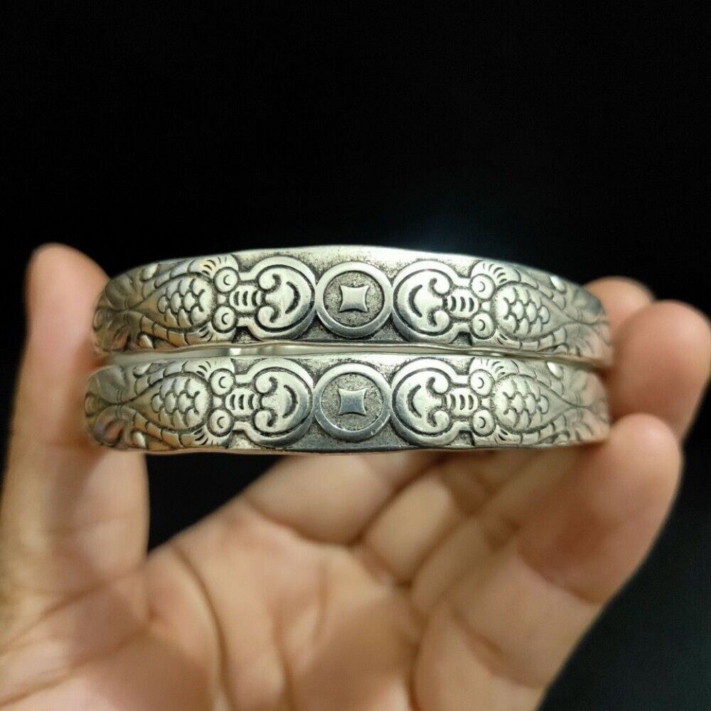 A Pair Old Chinese tibet silver handcarved double fish Bracelets