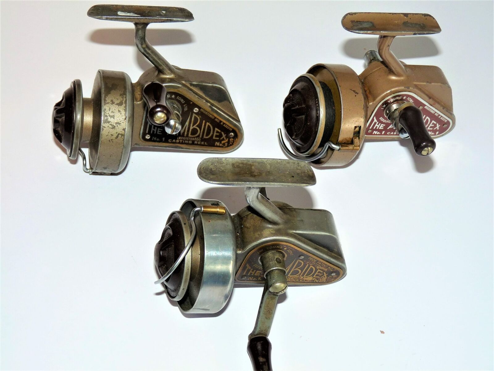 Three JW Youngs Ambidex Fixed Spool Reels With Half Bail Arms