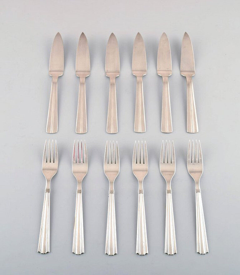 Complete 6 p. Ercuis Art deco fish cutlery in silver plate.