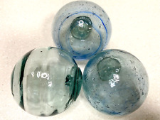 Rare Antique Japanese Glass Fishing Floats: Set of 3 with Swirls and Bubbles picture