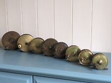 GOOD COLLECTION OF ANTIQUE HEAVY BRASS FISHING REELS INCLUDING FARLOW OF LONDON  picture