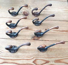 Eight vintage metal hat and coat hooks picture