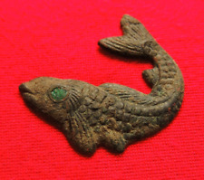 Ancient bronze artifact Fish picture