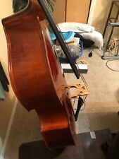 used 3/4 upright double bass comes with bag, bow and peg.   picture