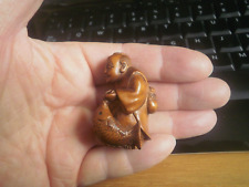 1a.. Hand Carved boxwood netsuke Japanese fisherman with fish and stick figure picture