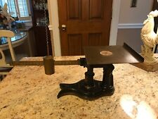 antique Howe iron and brass fish tail scale picture