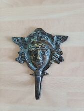 Antique brass coat hook face of a goddess picture