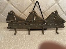 Sailboats Cast iron 4 hook wallhanger color Rust nice & hefty picture