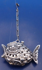Vintage sterling silver fish shaped tea strainer with chain picture