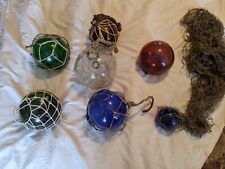 Collection of blown glass fishing net floats picture