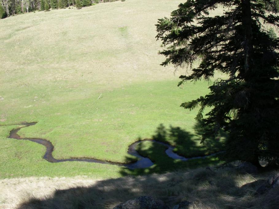 Cool shadow, sun filled valley