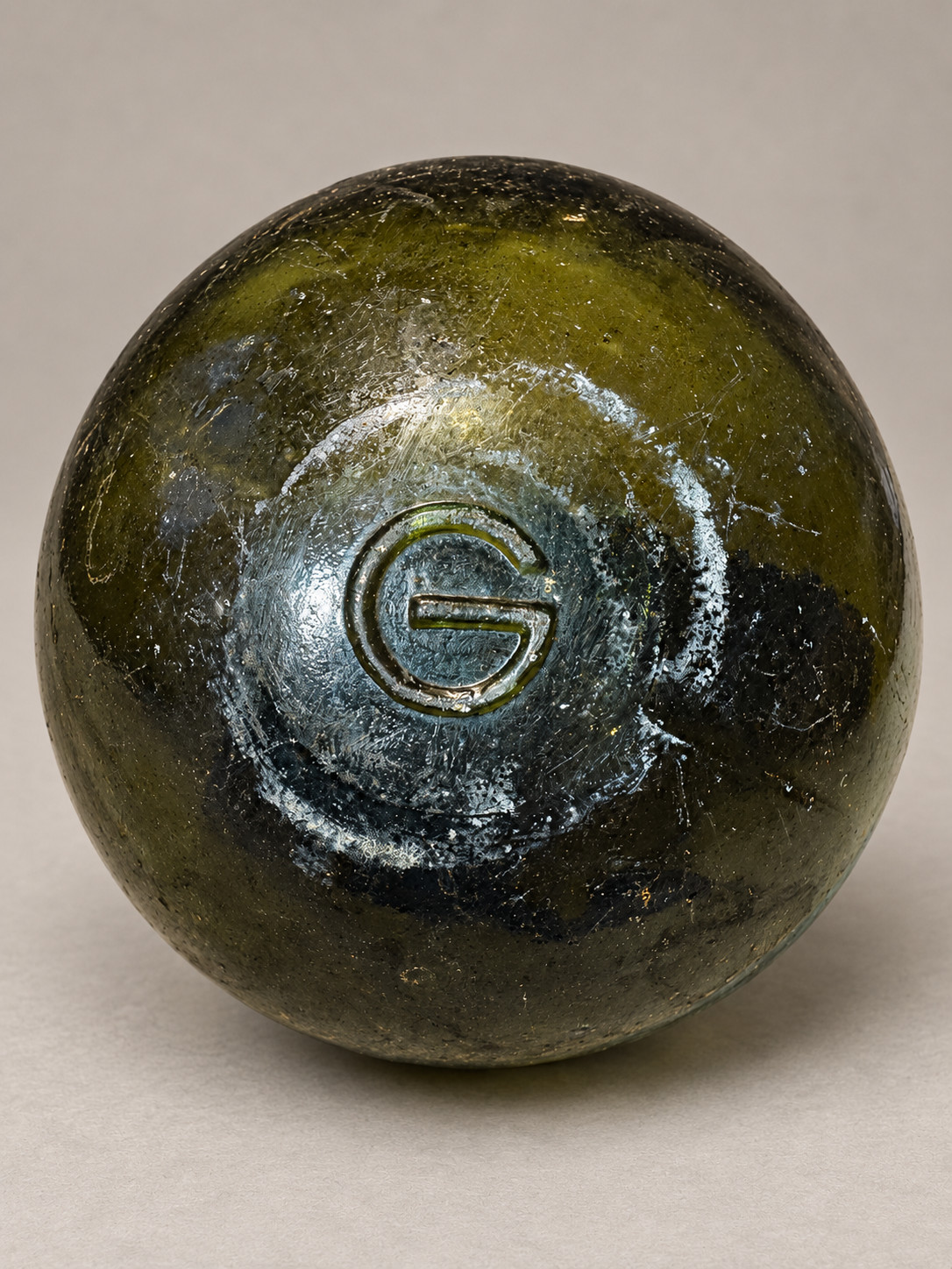 Vintage German G Glass Fishing Float Dark Olive Green Embossed Mark Approx 4”