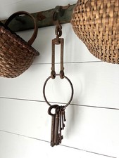 Antique Hand-Forged Iron Hook & Ring With Seven Large Skeleton Keys picture