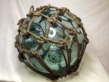 Vintage GREEN Japanese GLASS Fishing FLOAT With Full Netting HOKUYO Hallmark picture